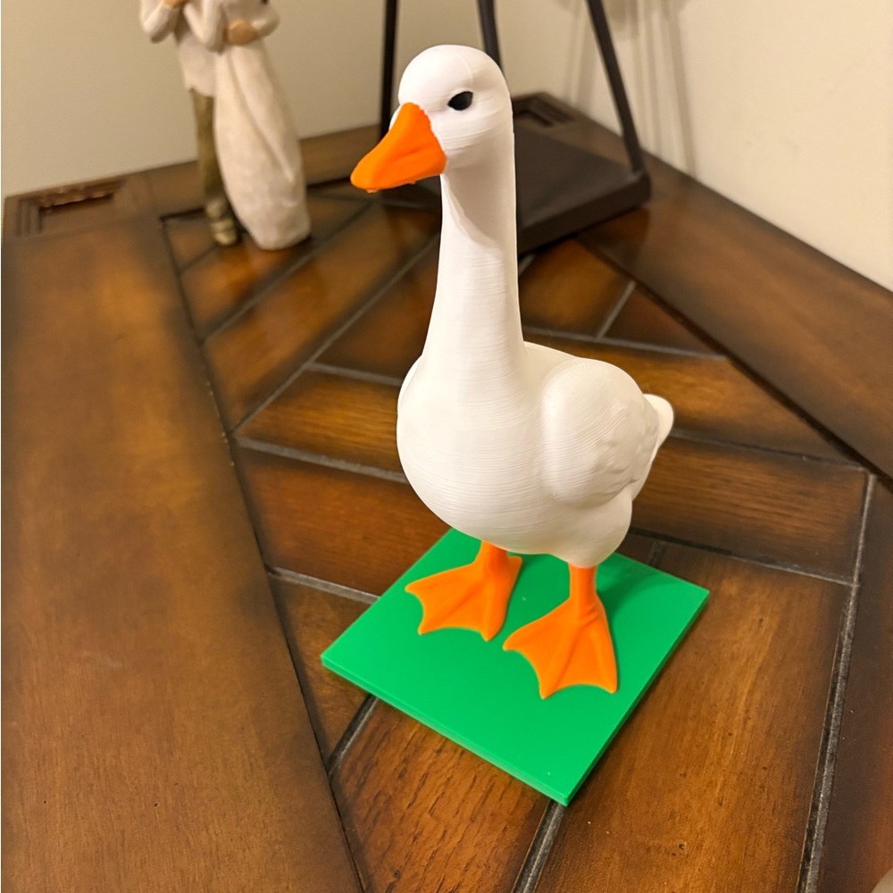 White and Orange Goose Figurine for Birds